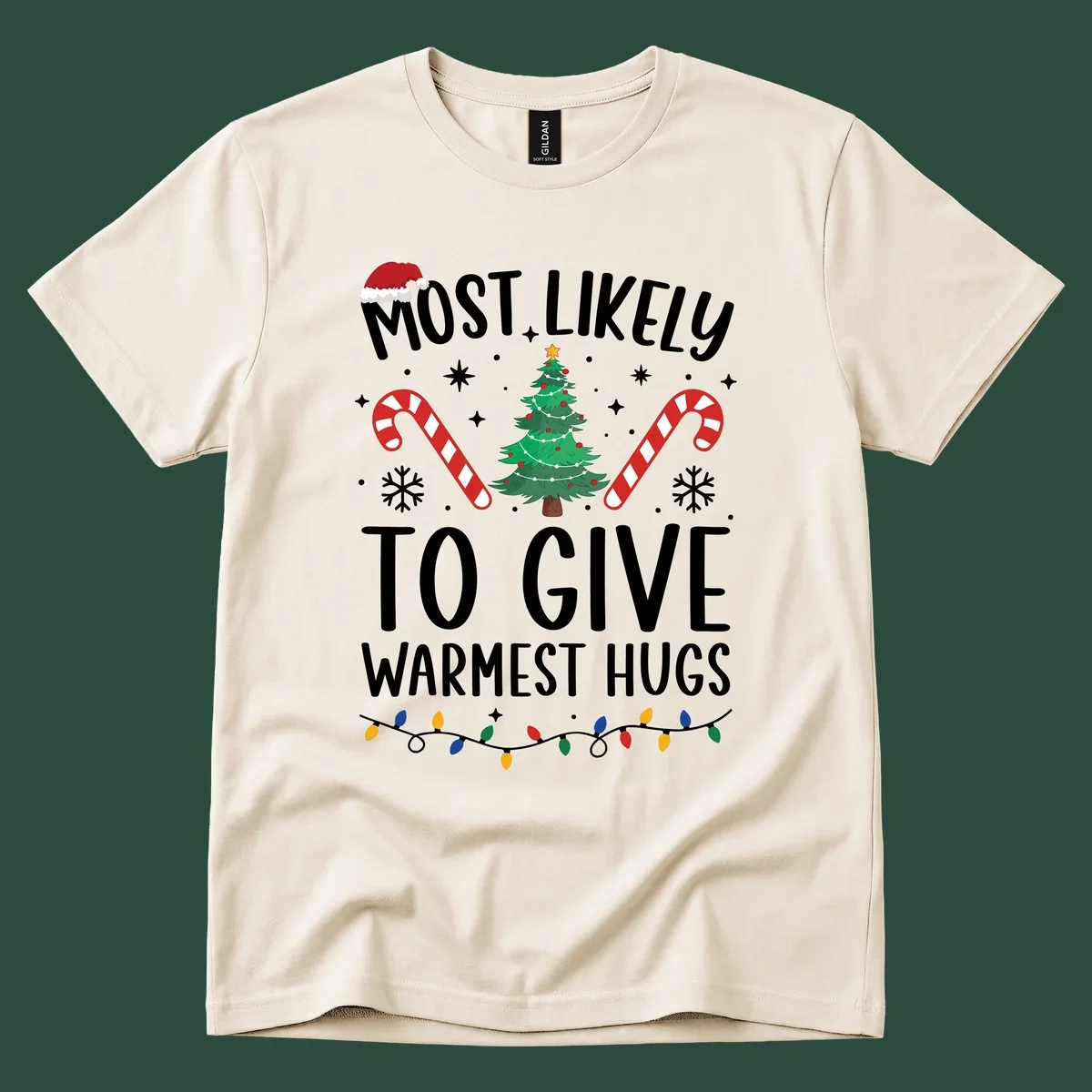 Christmas 'Most Likely To Give Warmest Hugs' design with tree, candy canes, and lights.