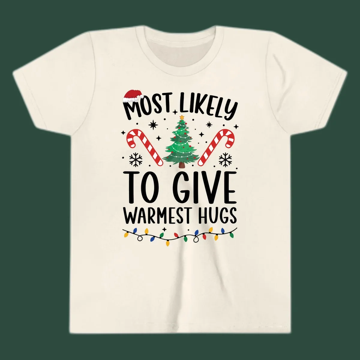 Christmas 'Most Likely To Give Warmest Hugs' design with tree, candy canes, and lights.