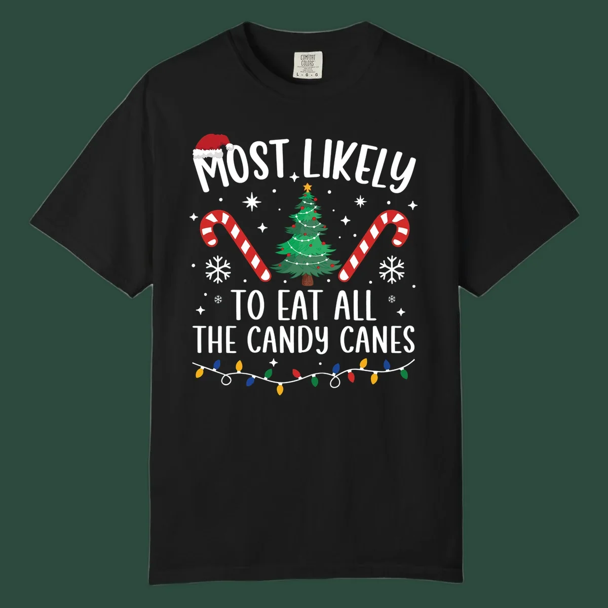 Most likely to eat all candy canes Christmas design with text, tree, candy canes, and lights.