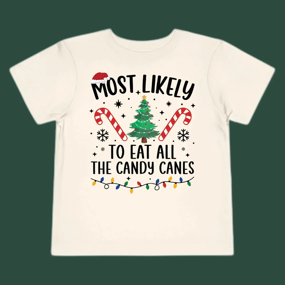 Most likely to eat all candy canes Christmas design with text, tree, candy canes, and lights.