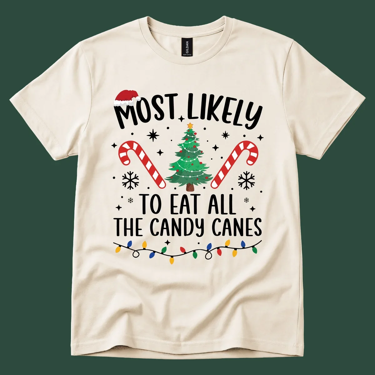 Most likely to eat all candy canes Christmas design with text, tree, candy canes, and lights.