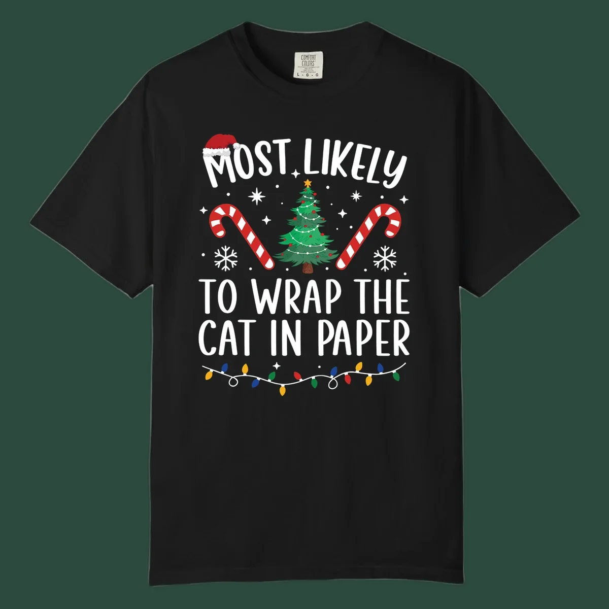 Most Likely To Wrap The Cat Christmas design with text, Santa hat, tree, candy canes, and lights.