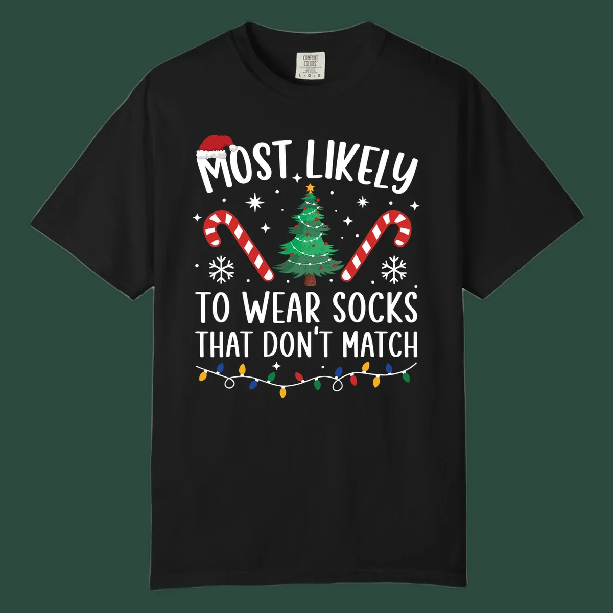 Most Likely To Wear Mismatched Socks Christmas design with text, Santa hat, tree, candy canes, and lights.