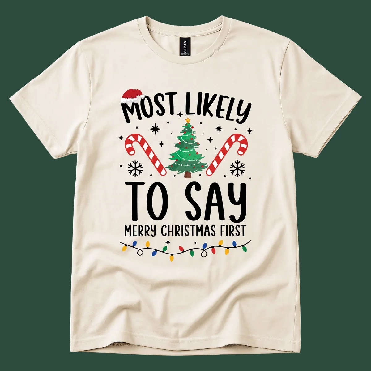 Most Likely To Say Merry Christmas First text with Christmas tree, candy canes, and Santa hat. Merry Christmas First keyword.