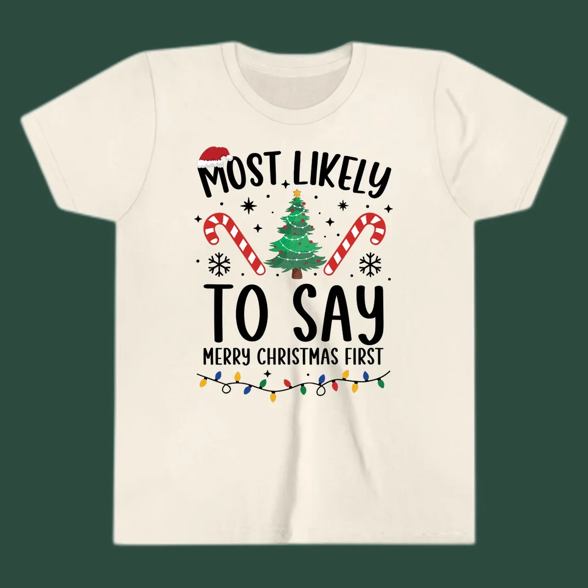 Most Likely To Say Merry Christmas First text with Christmas tree, candy canes, and Santa hat. Merry Christmas First keyword.