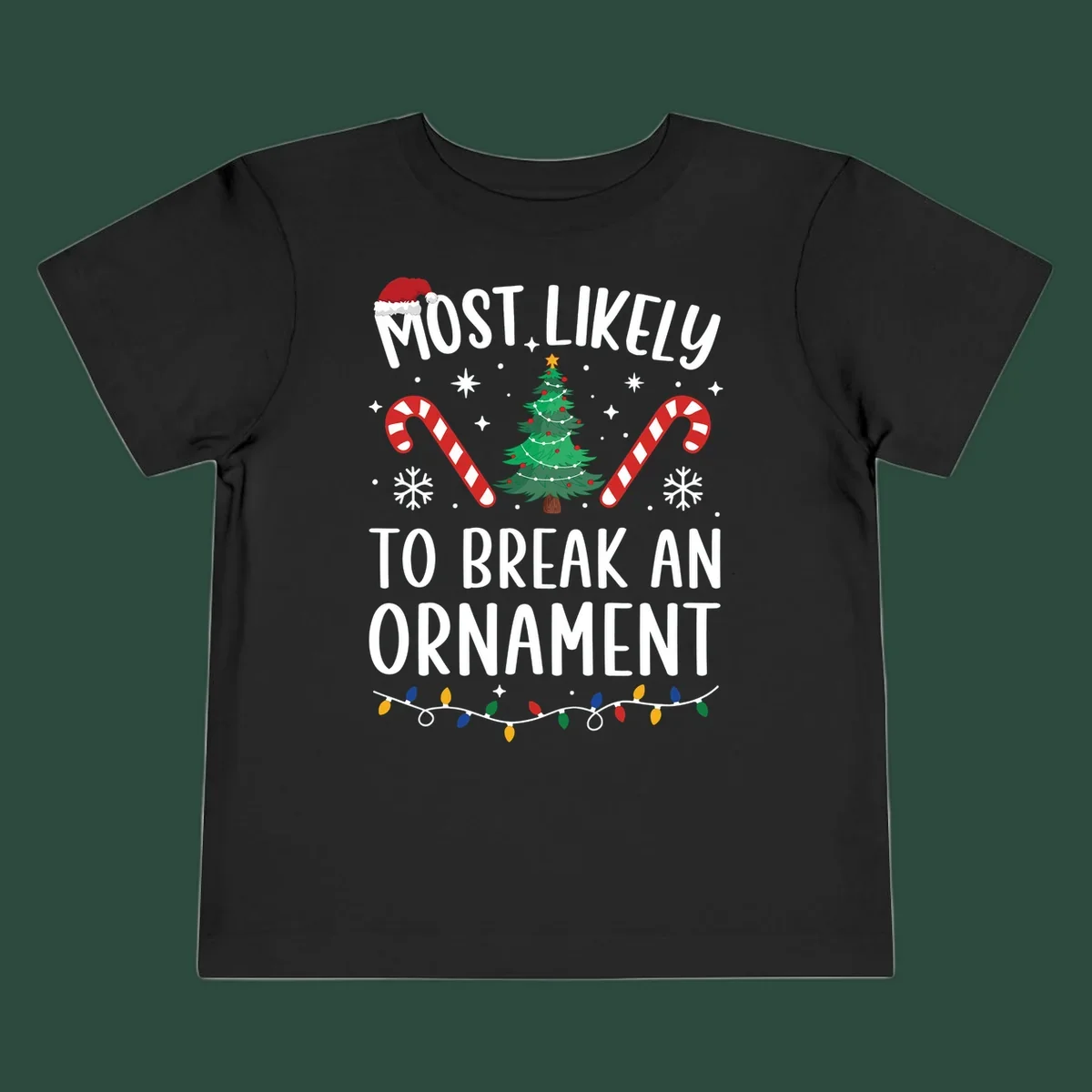 Most likely to break ornament Christmas graphic with text, tree, candy canes, and Santa hat.