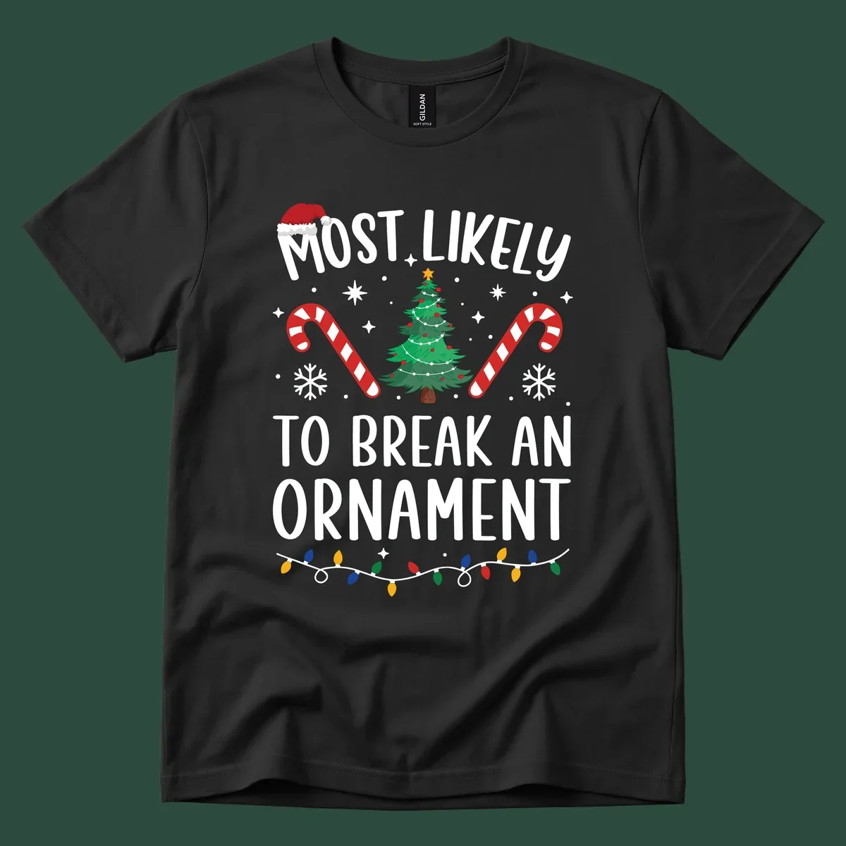 Most likely to break ornament Christmas graphic with text, tree, candy canes, and Santa hat.