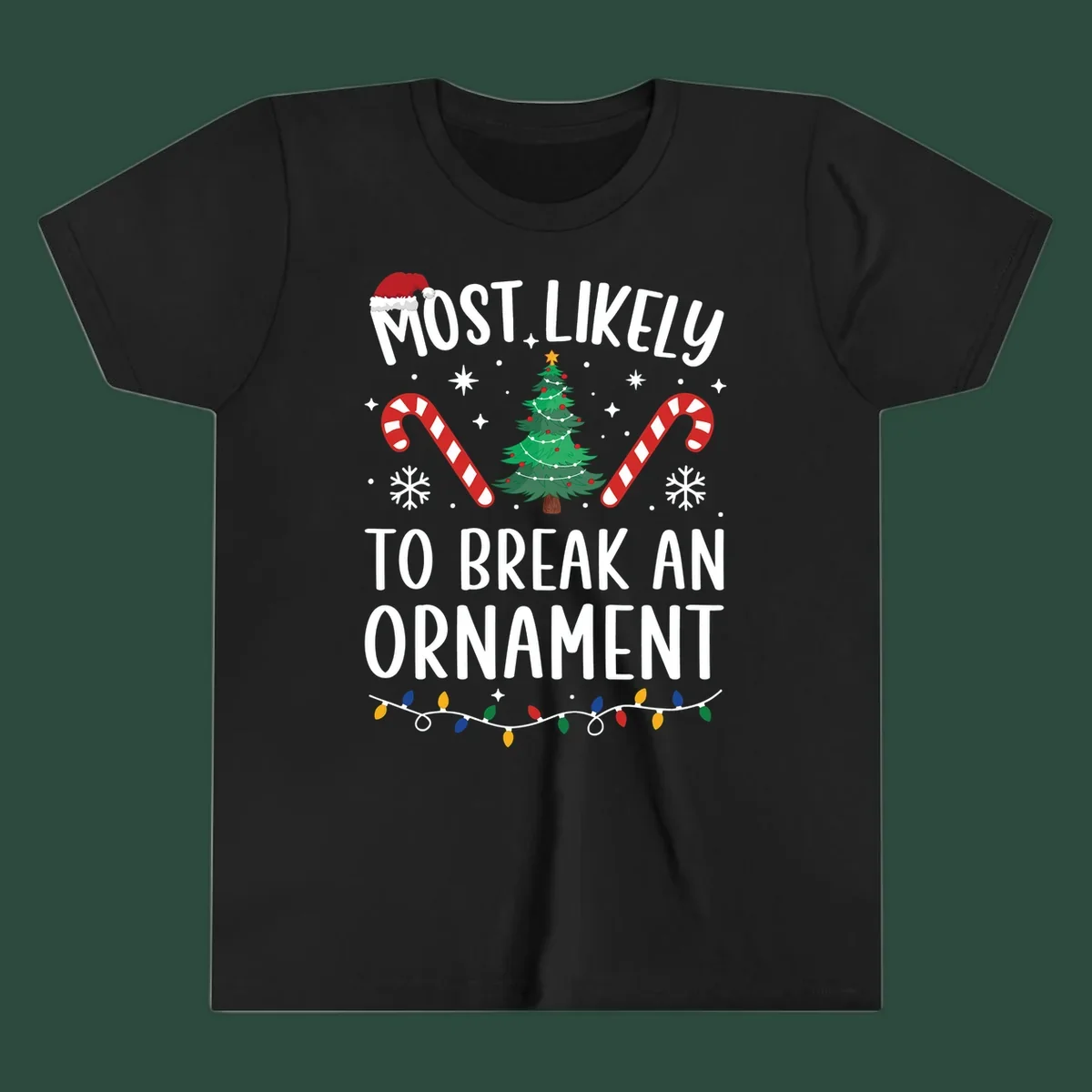 Most likely to break ornament Christmas graphic with text, tree, candy canes, and Santa hat.
