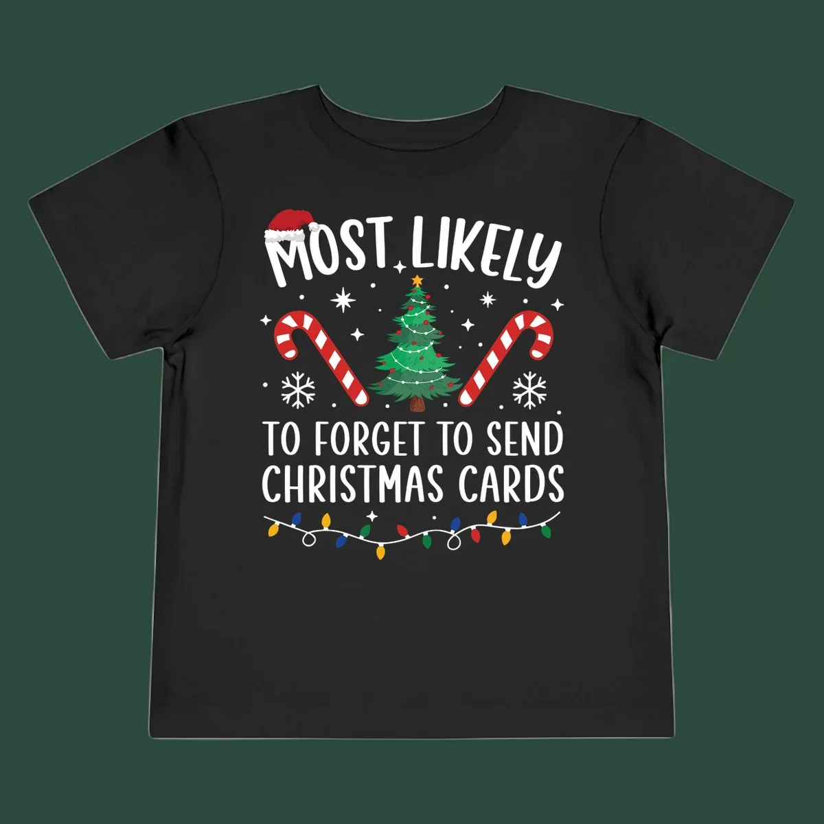 Text and graphics for "Most Likely To Forget Christmas Cards" design, featuring a Santa hat, tree, and candy canes.