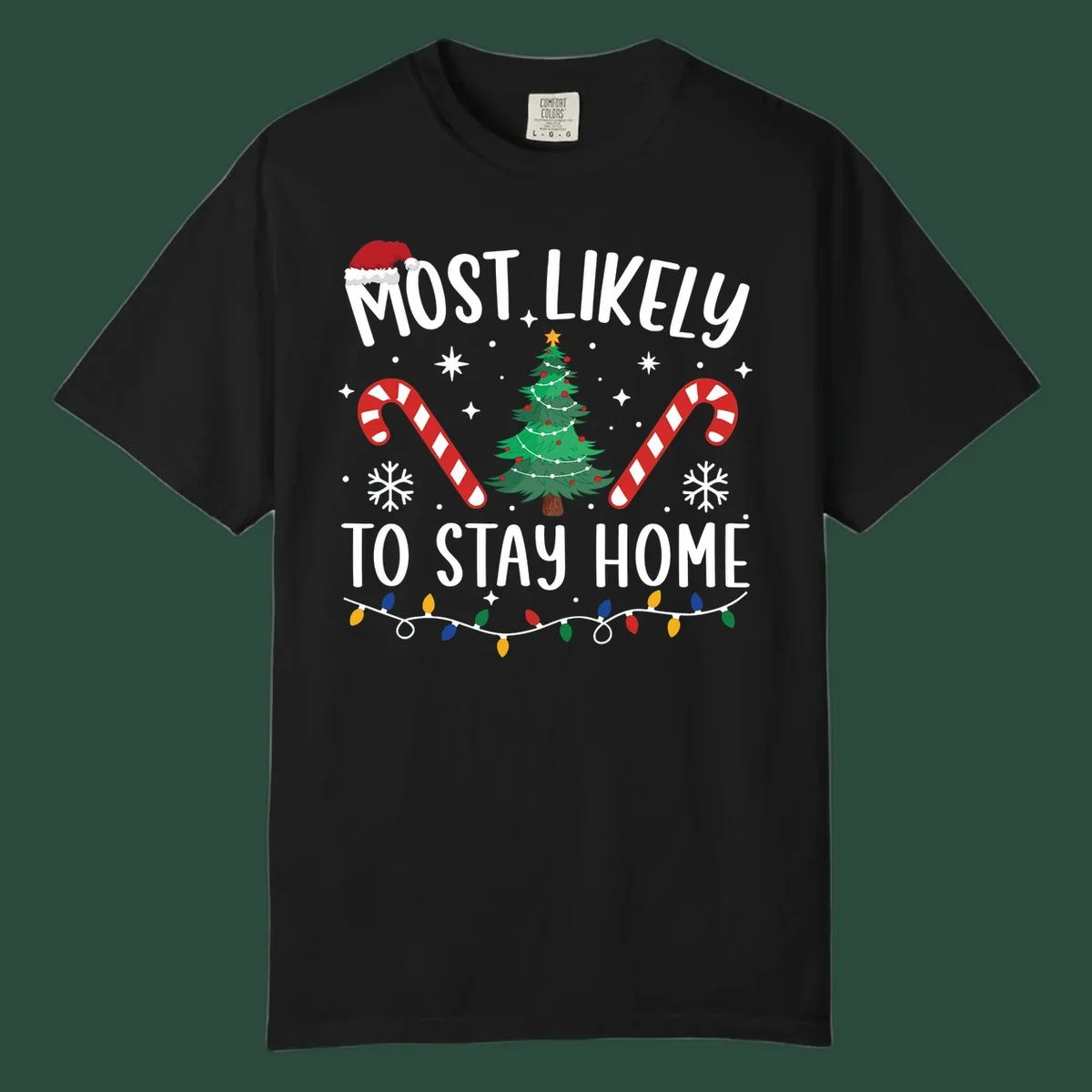 Most likely to stay home Christmas design with text, tree, candy canes, and lights.