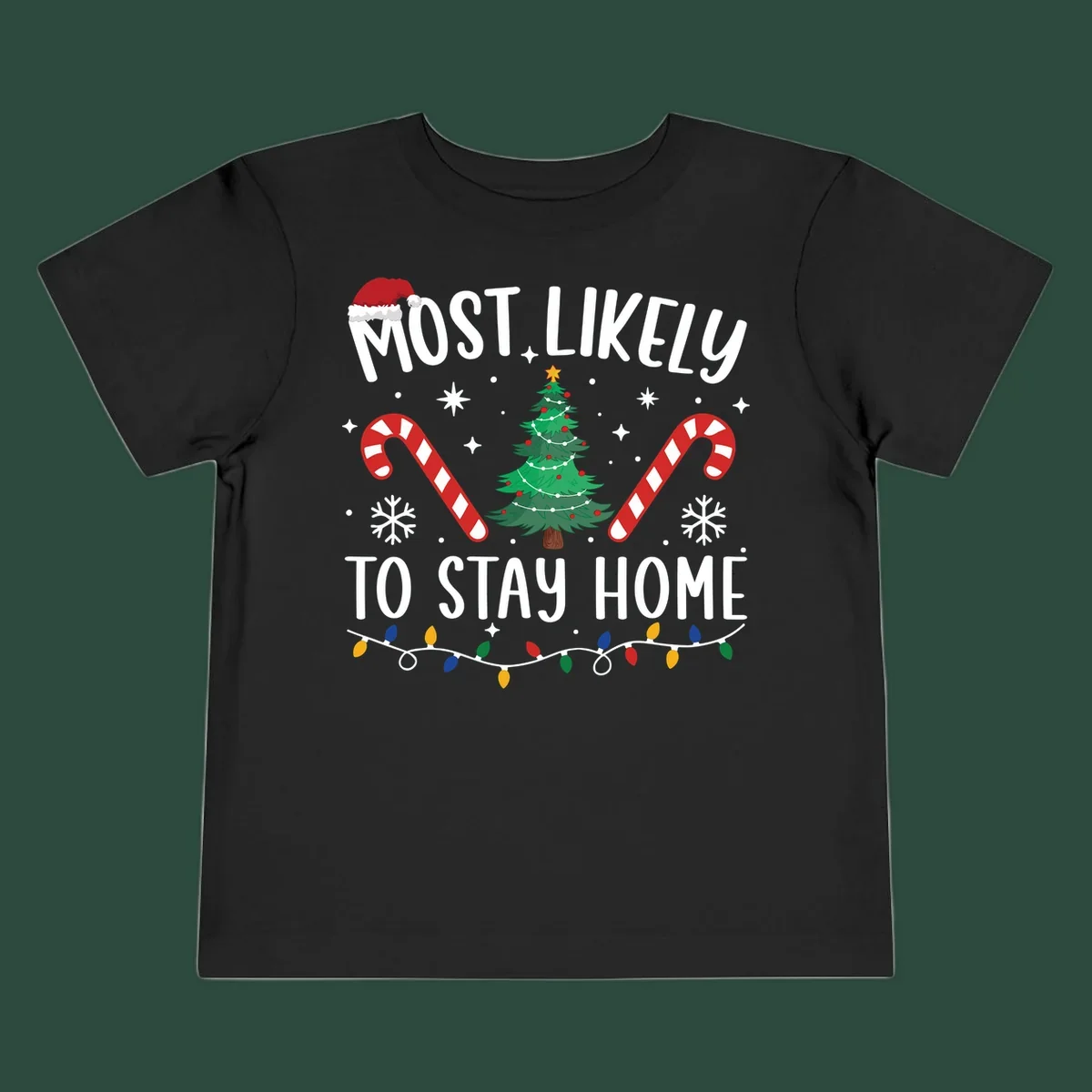 Most likely to stay home Christmas design with text, tree, candy canes, and lights.