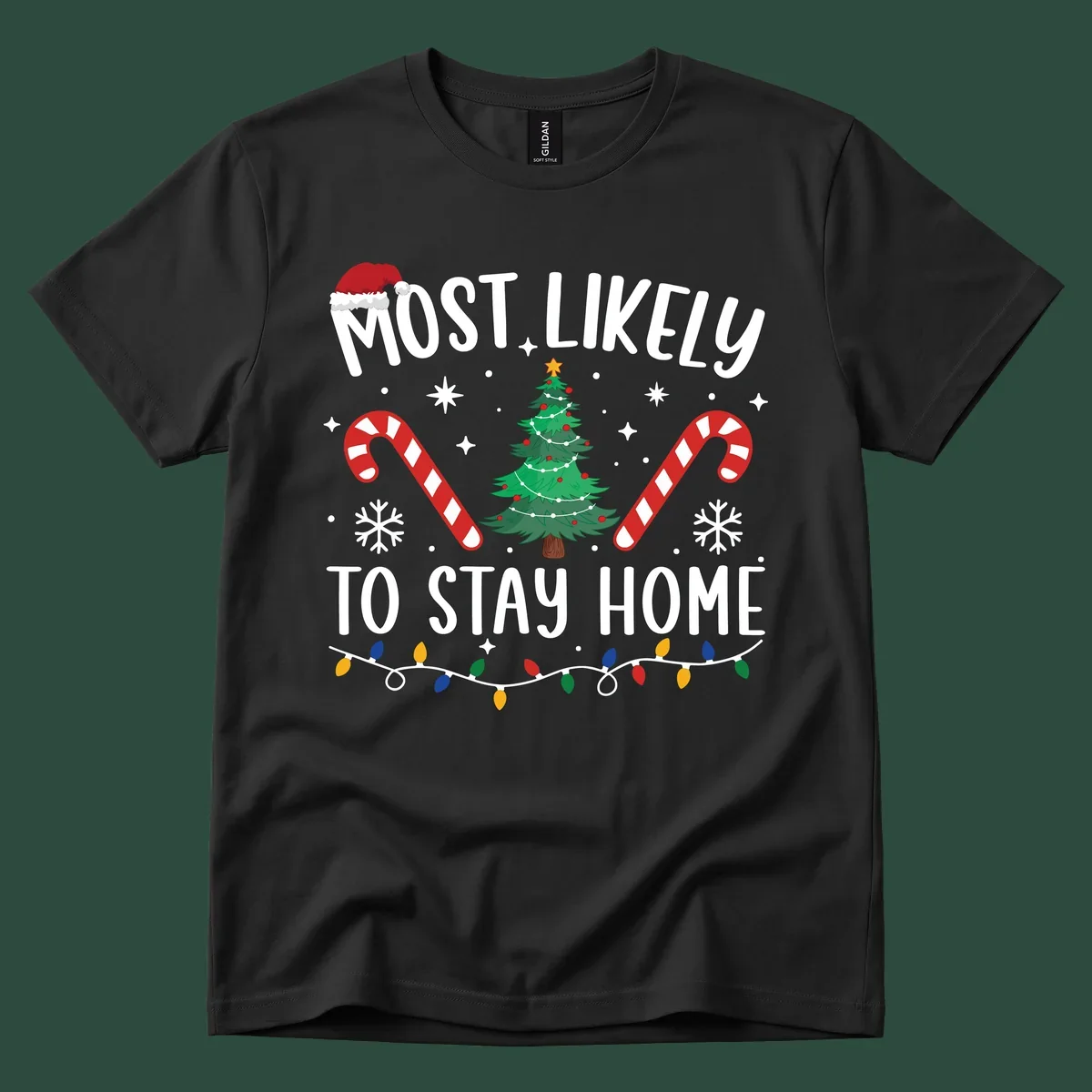 Most likely to stay home Christmas design with text, tree, candy canes, and lights.