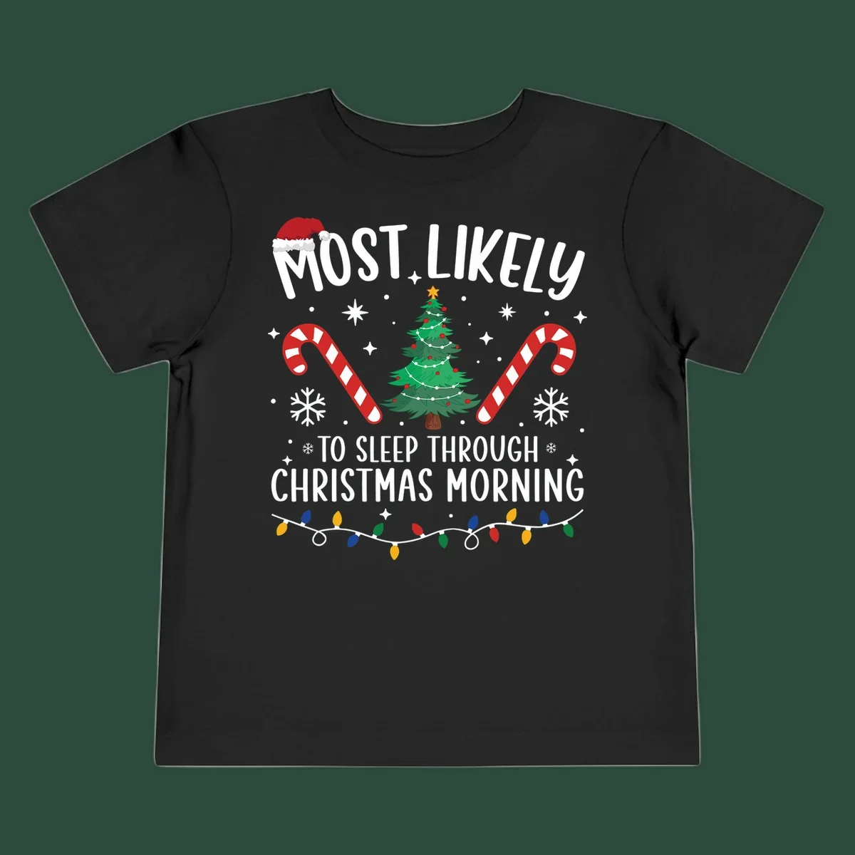 Text 'Most Likely To Sleep Through Christmas Morning' with Christmas icons like a tree, candy canes, and lights. Sleepy-christmas-morning design.
