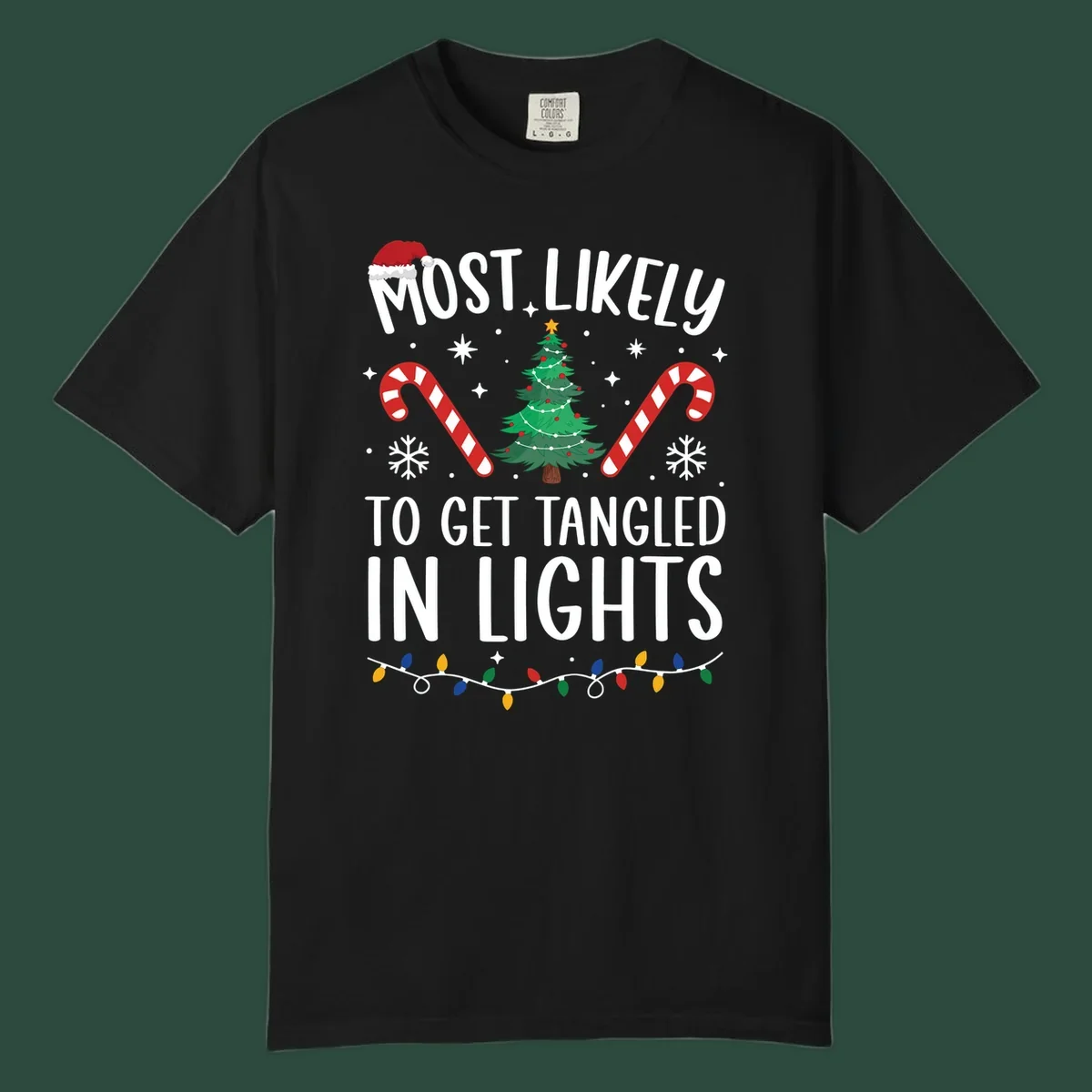 Most Likely To Get Tangled In Lights text with christmas tree, candy canes, and santa hat.