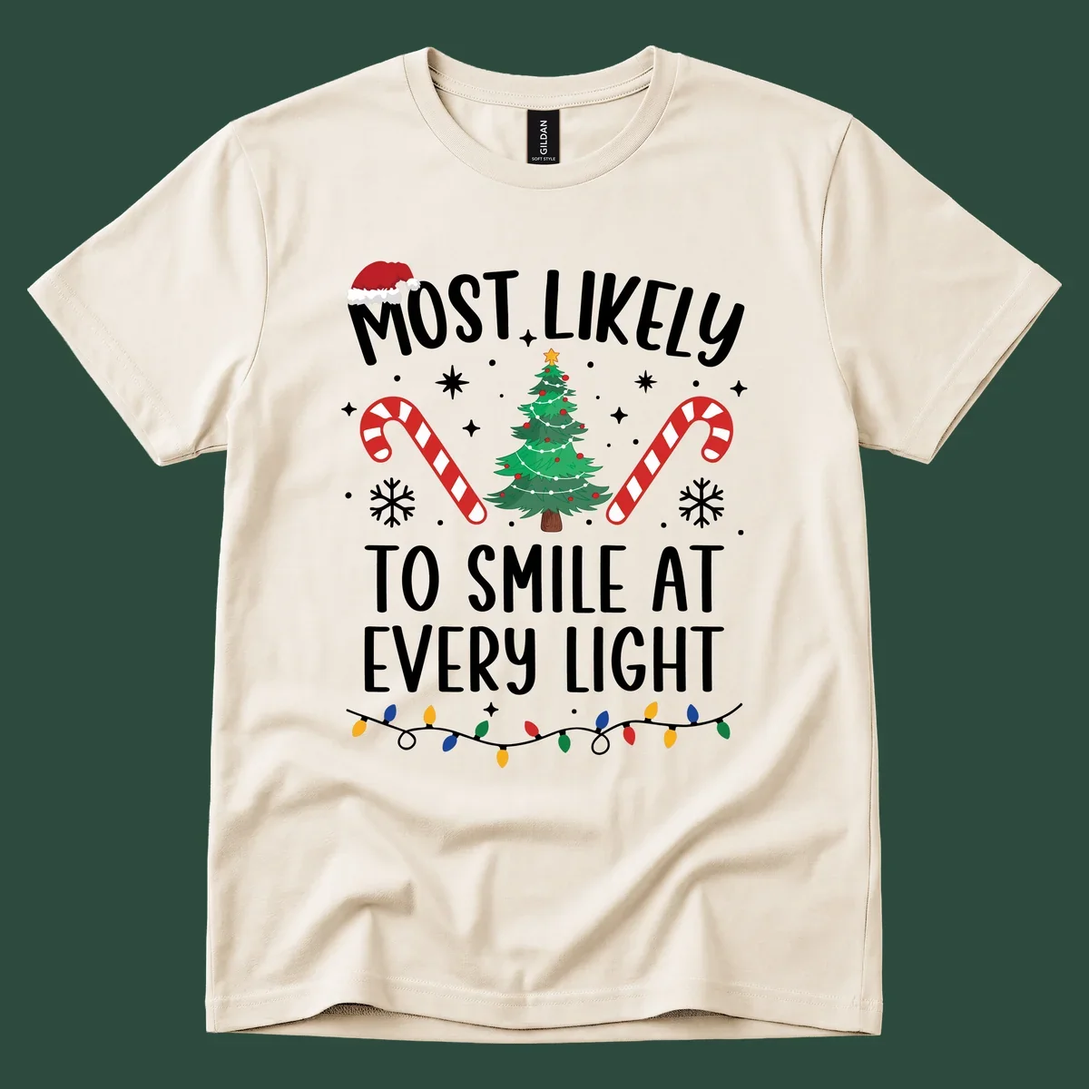 Most Likely To Smile At Every Light Christmas design with tree, candy canes, and lights.