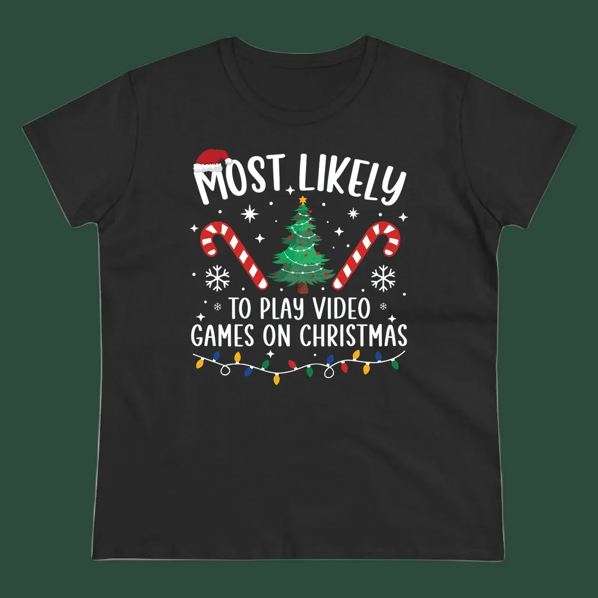 Most Likely To Play Video Games On Christmas design with text, Christmas tree, candy canes, and lights.
