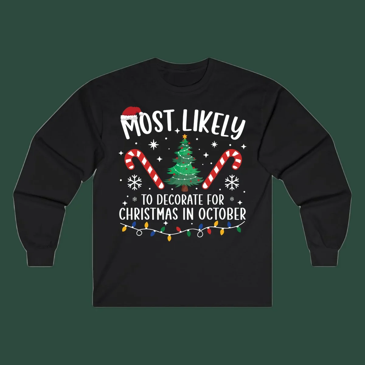 Most Likely To Decorate For Christmas In October text with Christmas tree, candy canes, and Santa hat.