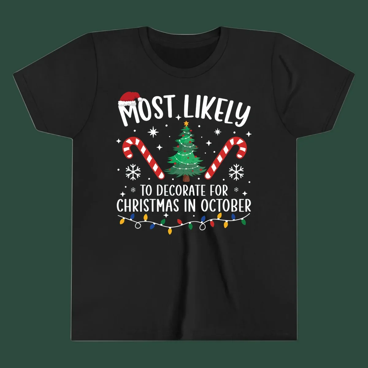 Most Likely To Decorate For Christmas In October text with Christmas tree, candy canes, and Santa hat.