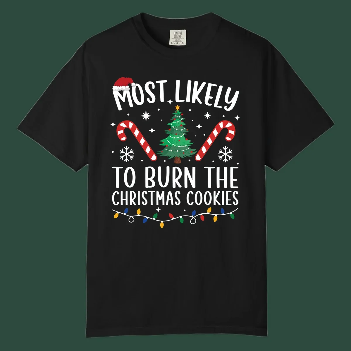 Most likely to burn Christmas Cookies text with Santa hat, Christmas tree, candy canes, snowflakes, stars, and lights. Christmas baking humor.