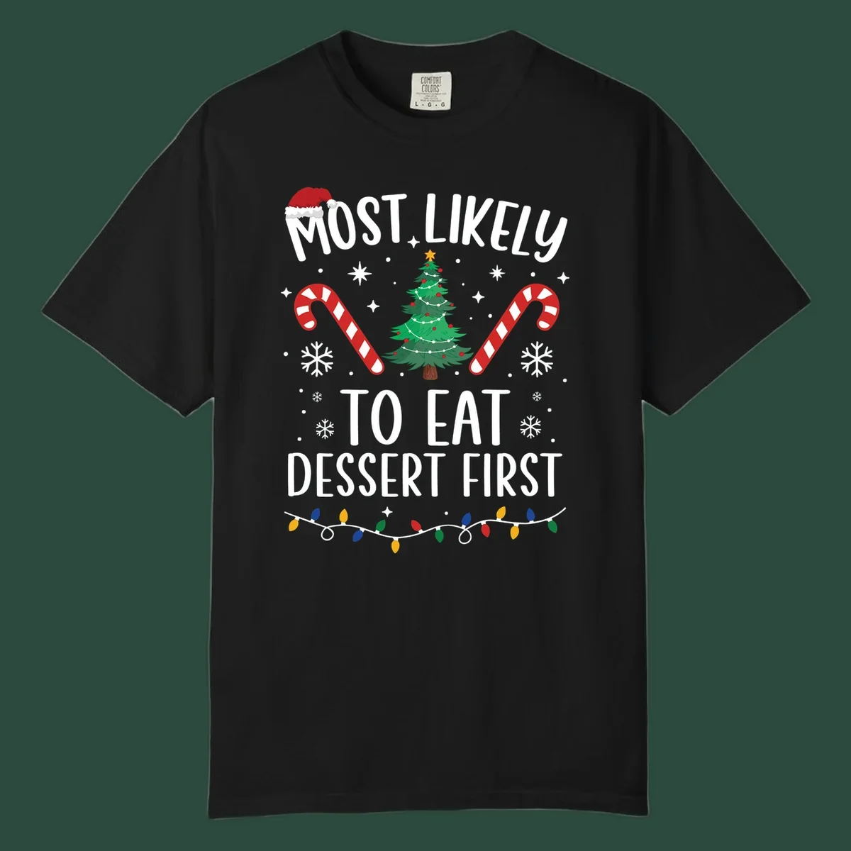 Most Likely To Eat Dessert First Christmas design with tree, candy canes, and Santa hat.