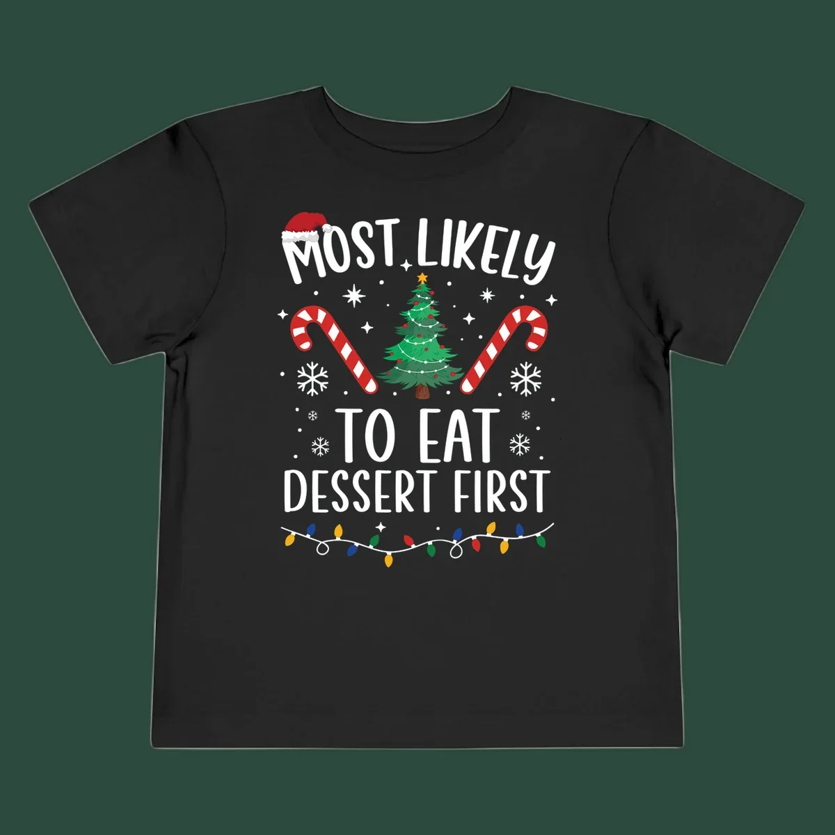Most Likely To Eat Dessert First Christmas design with tree, candy canes, and Santa hat.