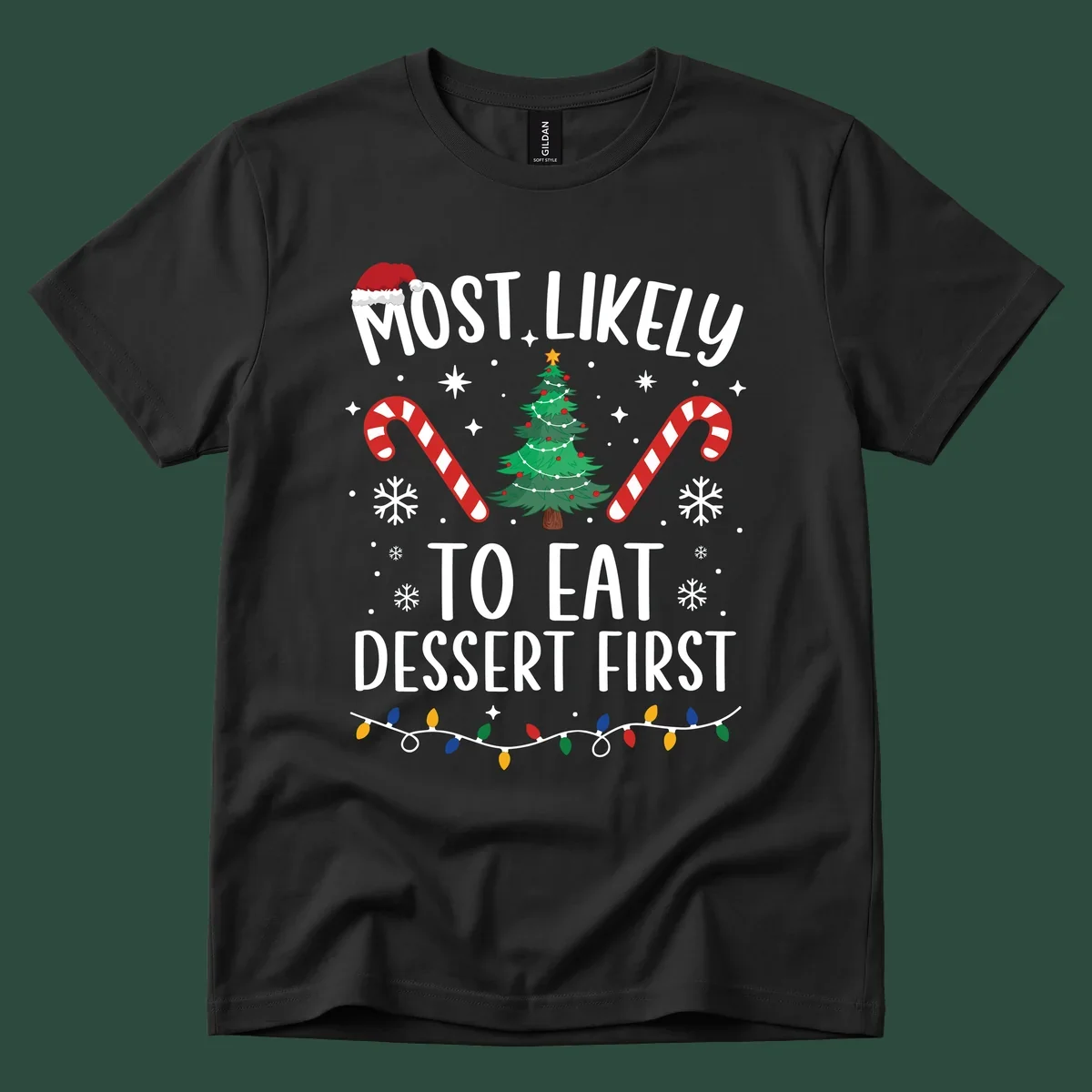 Most Likely To Eat Dessert First Christmas design with tree, candy canes, and Santa hat.