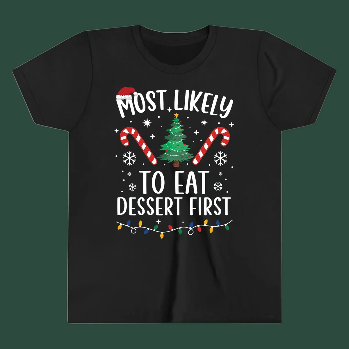 Most Likely To Eat Dessert First Christmas design with tree, candy canes, and Santa hat.