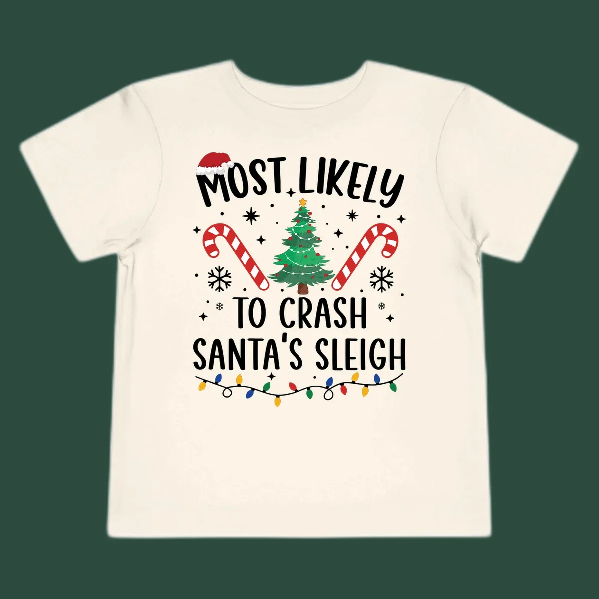 Most Likely To Crash Santa's Sleigh holiday design with Santa hat, Christmas tree, candy canes, and lights.
