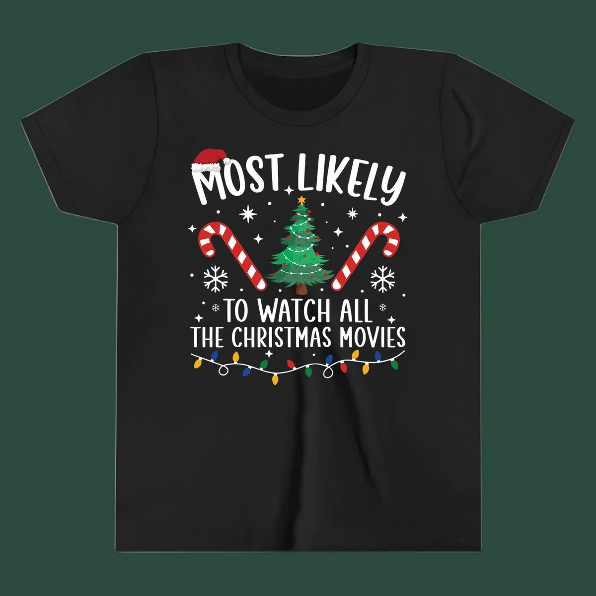 Most Likely To Watch All The Christmas Movies text with christmas tree, candy canes, and lights.