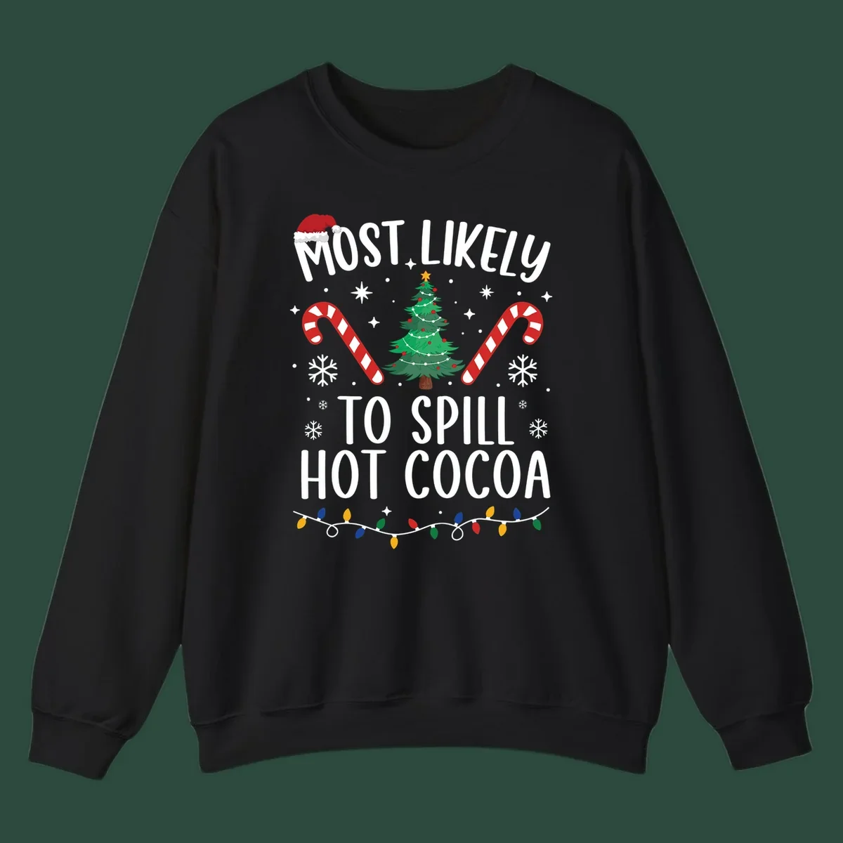 Most Likely To Spill Hot Cocoa Christmas design with text, tree, candy canes, and lights.
