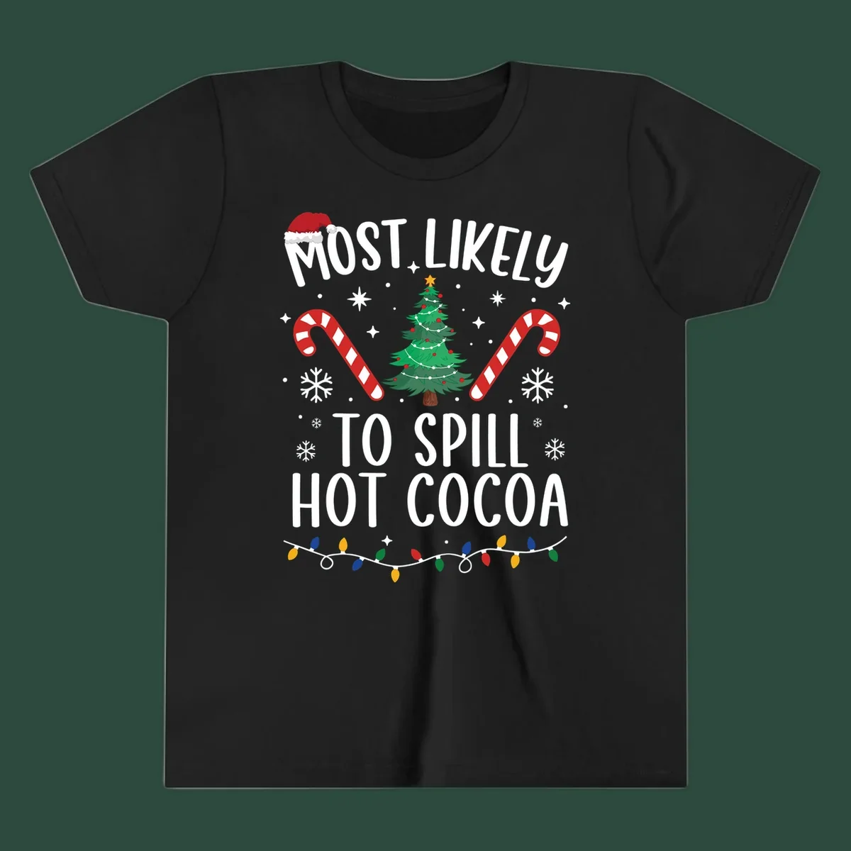 Most Likely To Spill Hot Cocoa Christmas design with text, tree, candy canes, and lights.