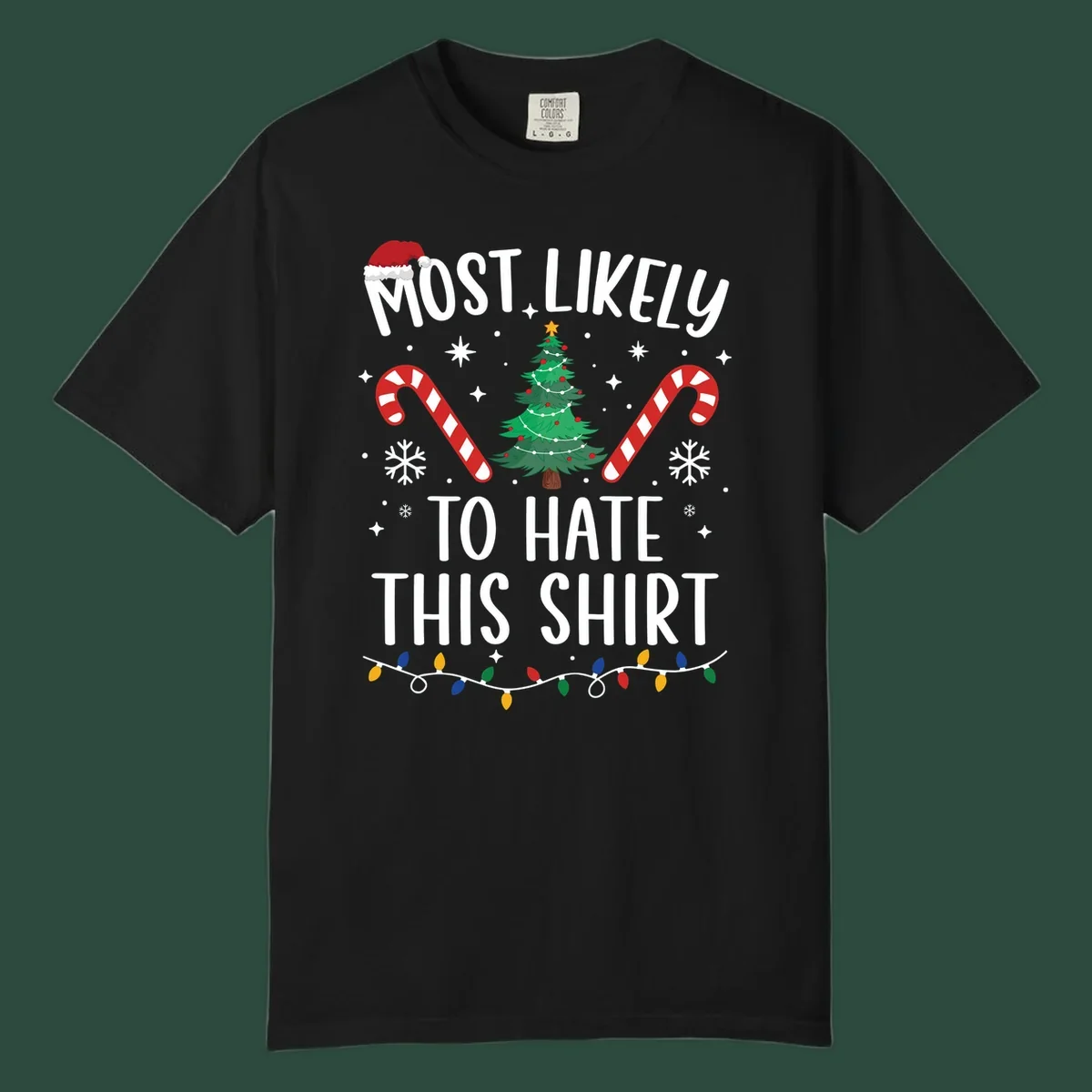 Text 'Most Likely To Hate This Shirt' with Christmas graphics like a tree, candy canes, and Santa hat.
