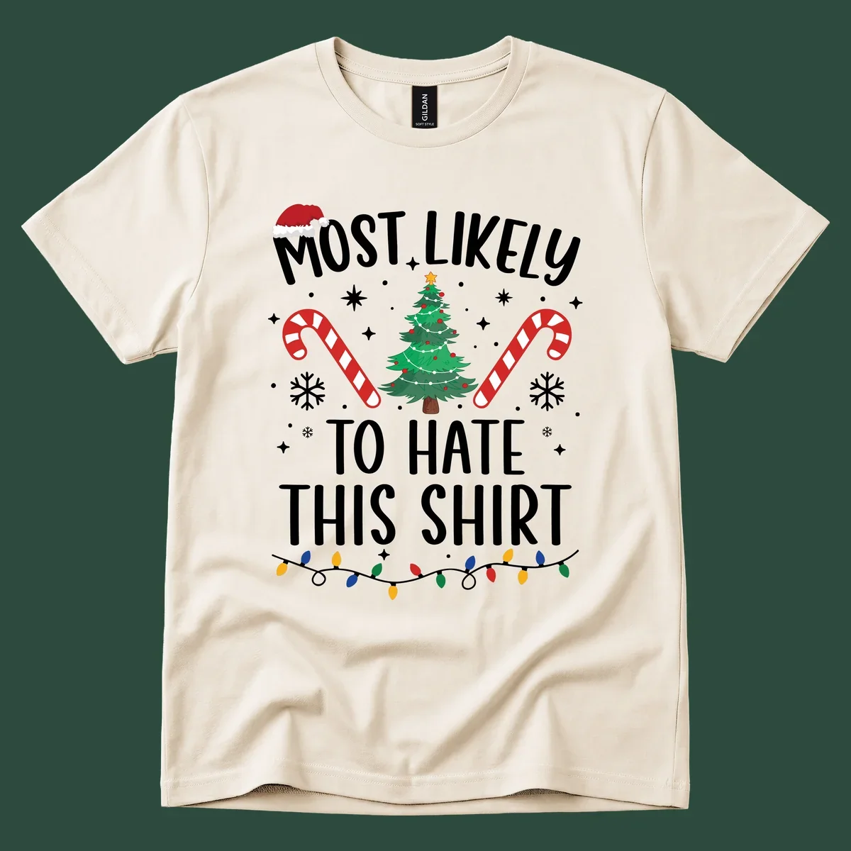Text 'Most Likely To Hate This Shirt' with Christmas graphics like a tree, candy canes, and Santa hat.
