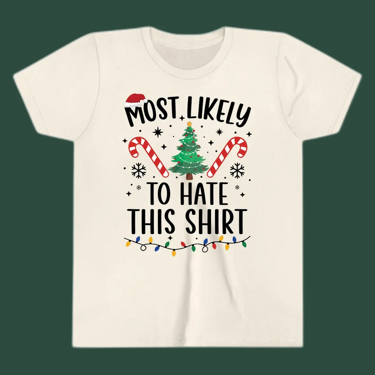 Text 'Most Likely To Hate This Shirt' with Christmas graphics like a tree, candy canes, and Santa hat.