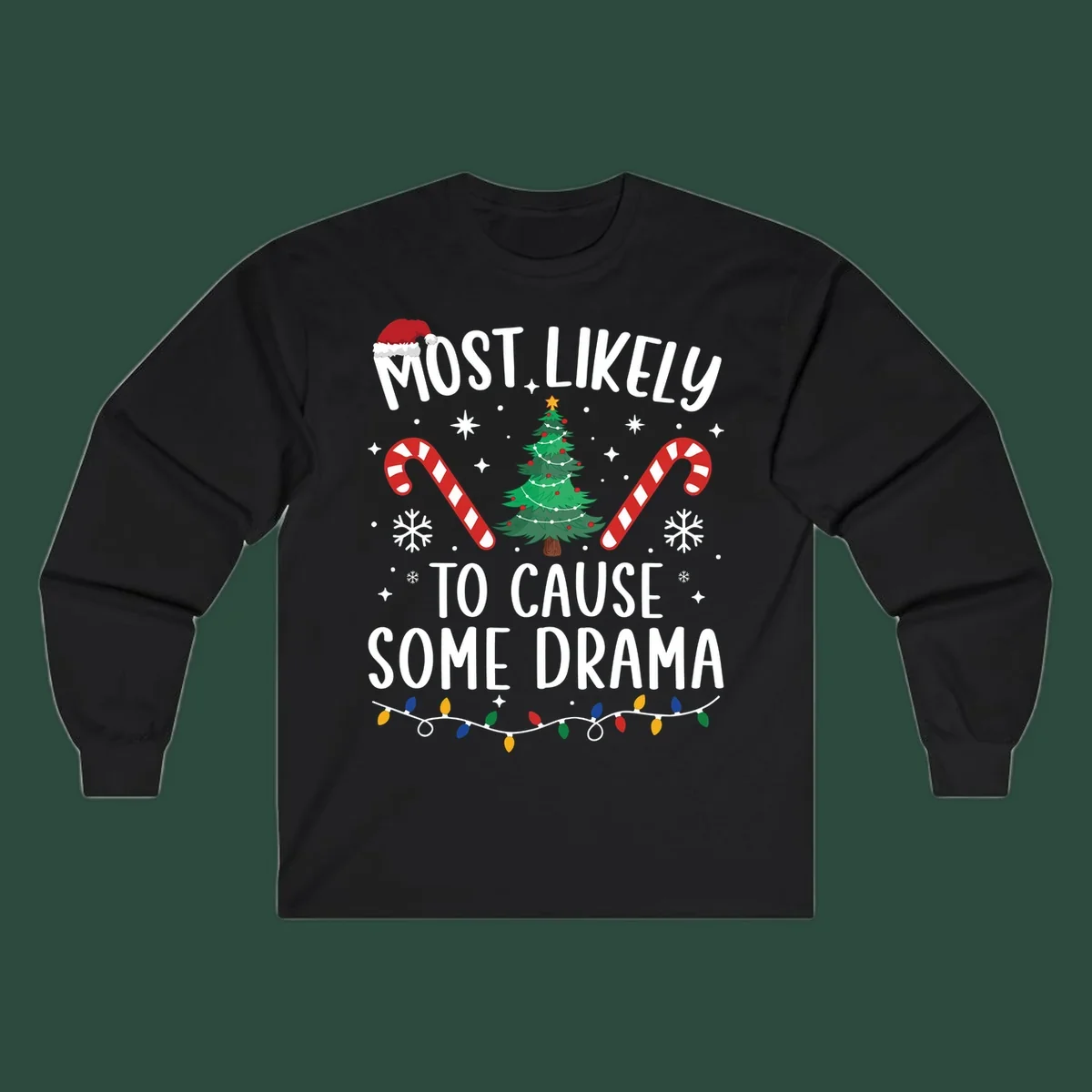 Most Likely To Cause Some Drama Christmas text with tree and decorations. Christmas crew shirt.