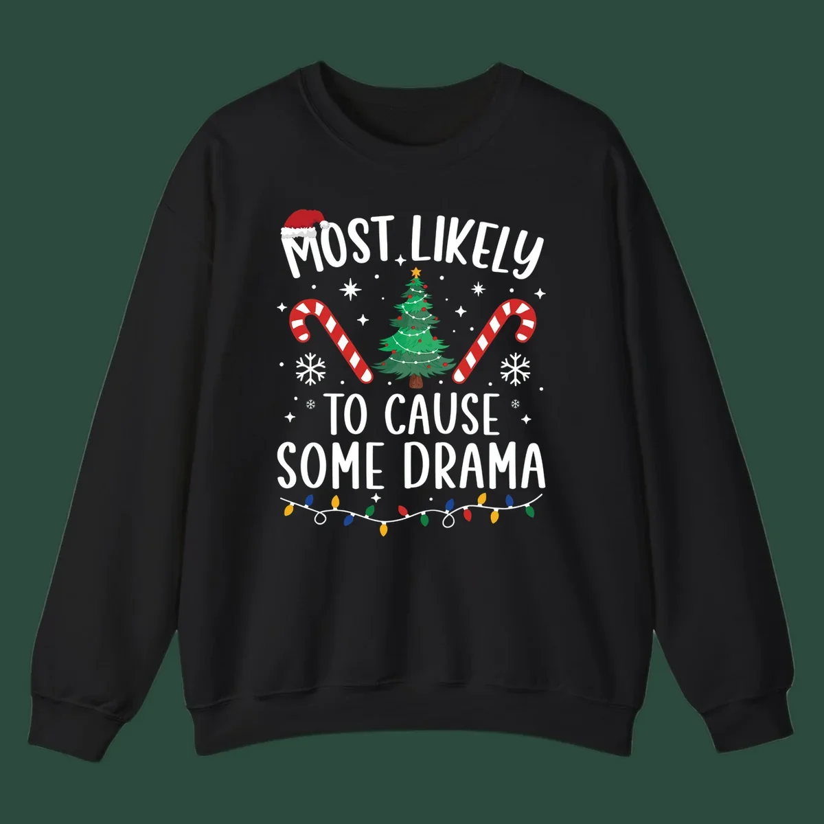 Most Likely To Cause Some Drama Christmas text with tree and decorations. Christmas crew shirt.