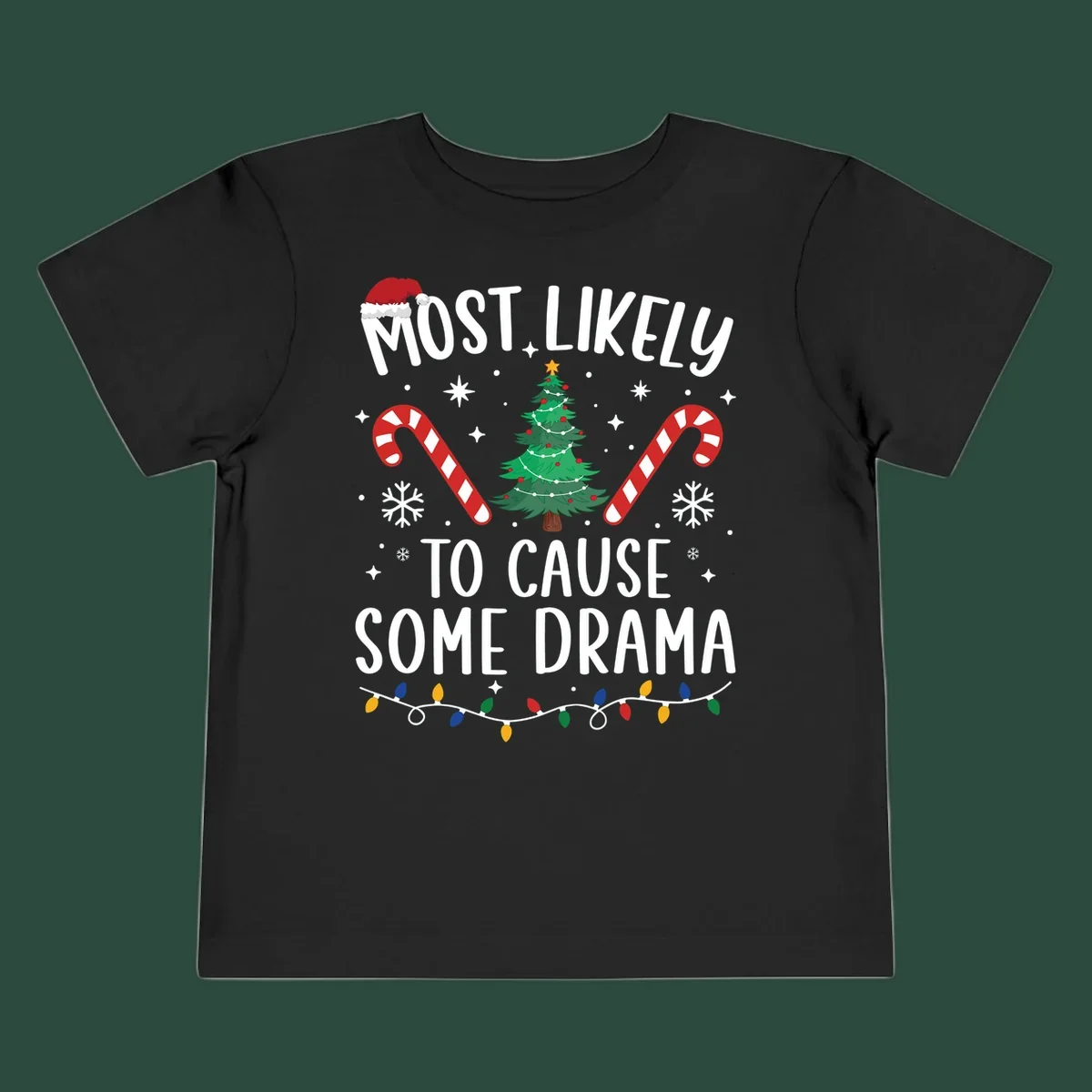 Most Likely To Cause Some Drama Christmas text with tree and decorations. Christmas crew shirt.