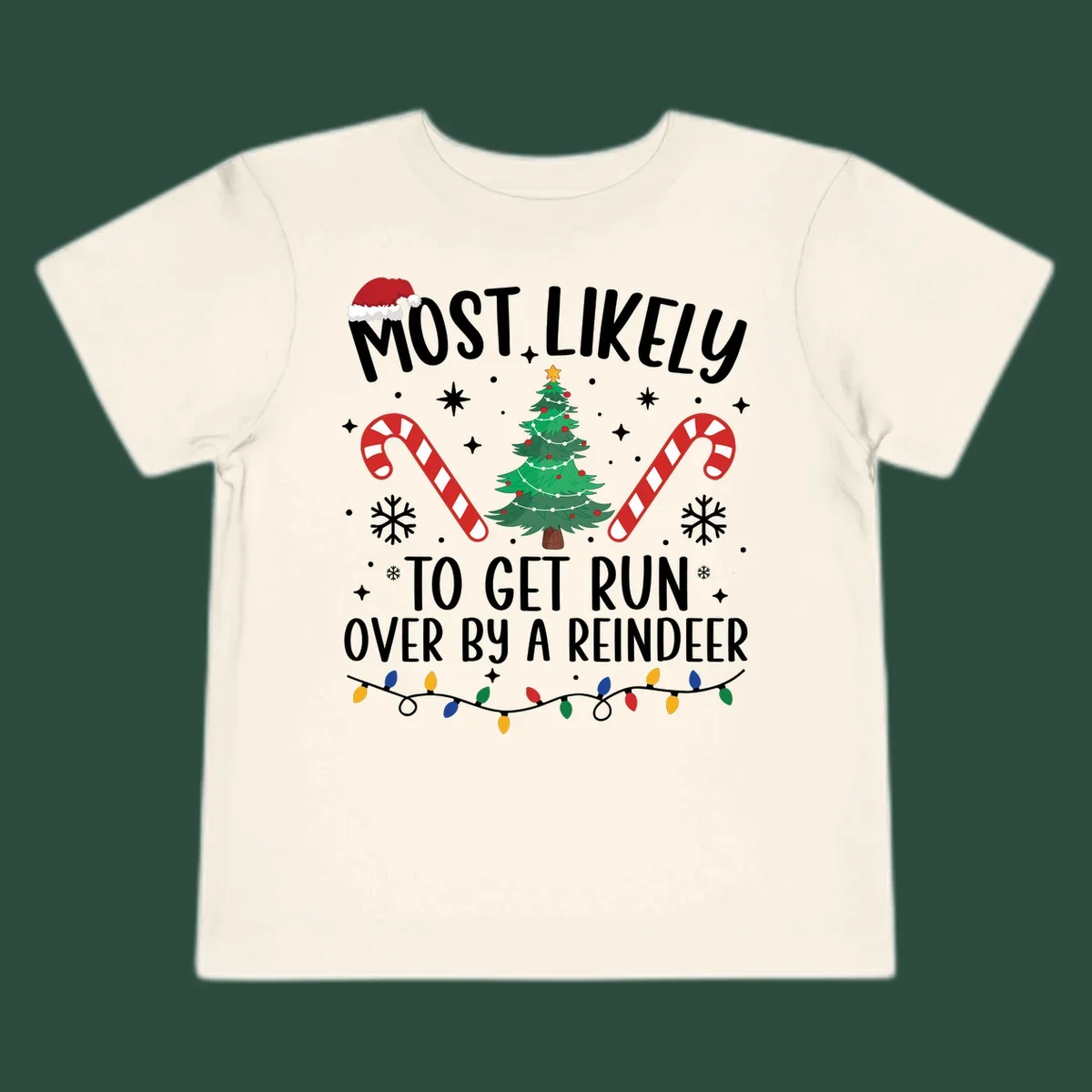 Most likely to get run over by reindeer Christmas design with tree, candy canes, and lights.