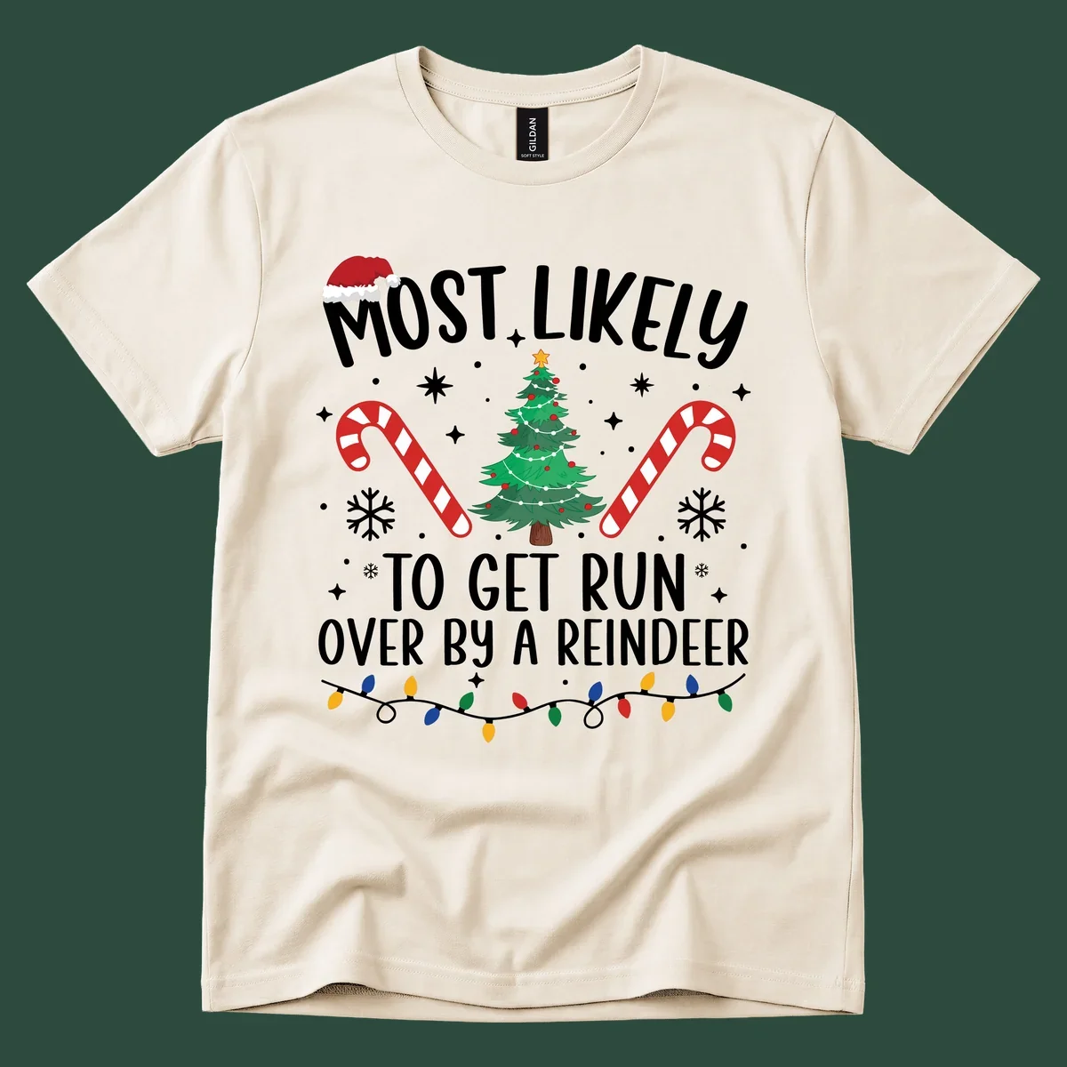 Most likely to get run over by reindeer Christmas design with tree, candy canes, and lights.