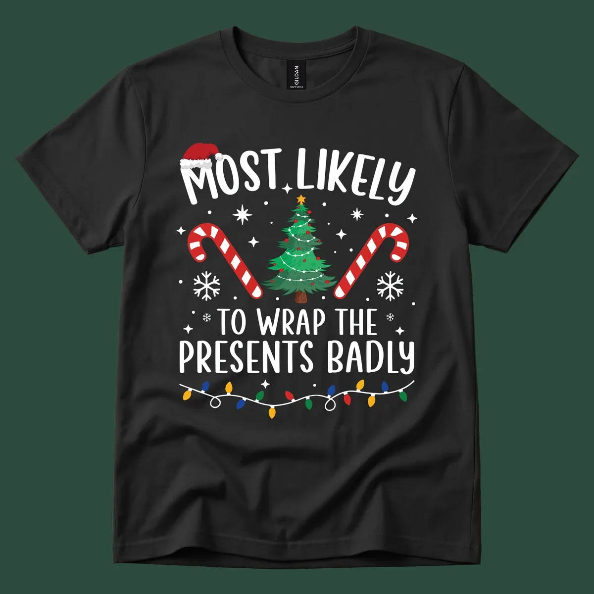 Most Likely To Wrap Presents Badly Christmas design with text, tree, candy canes, and lights.