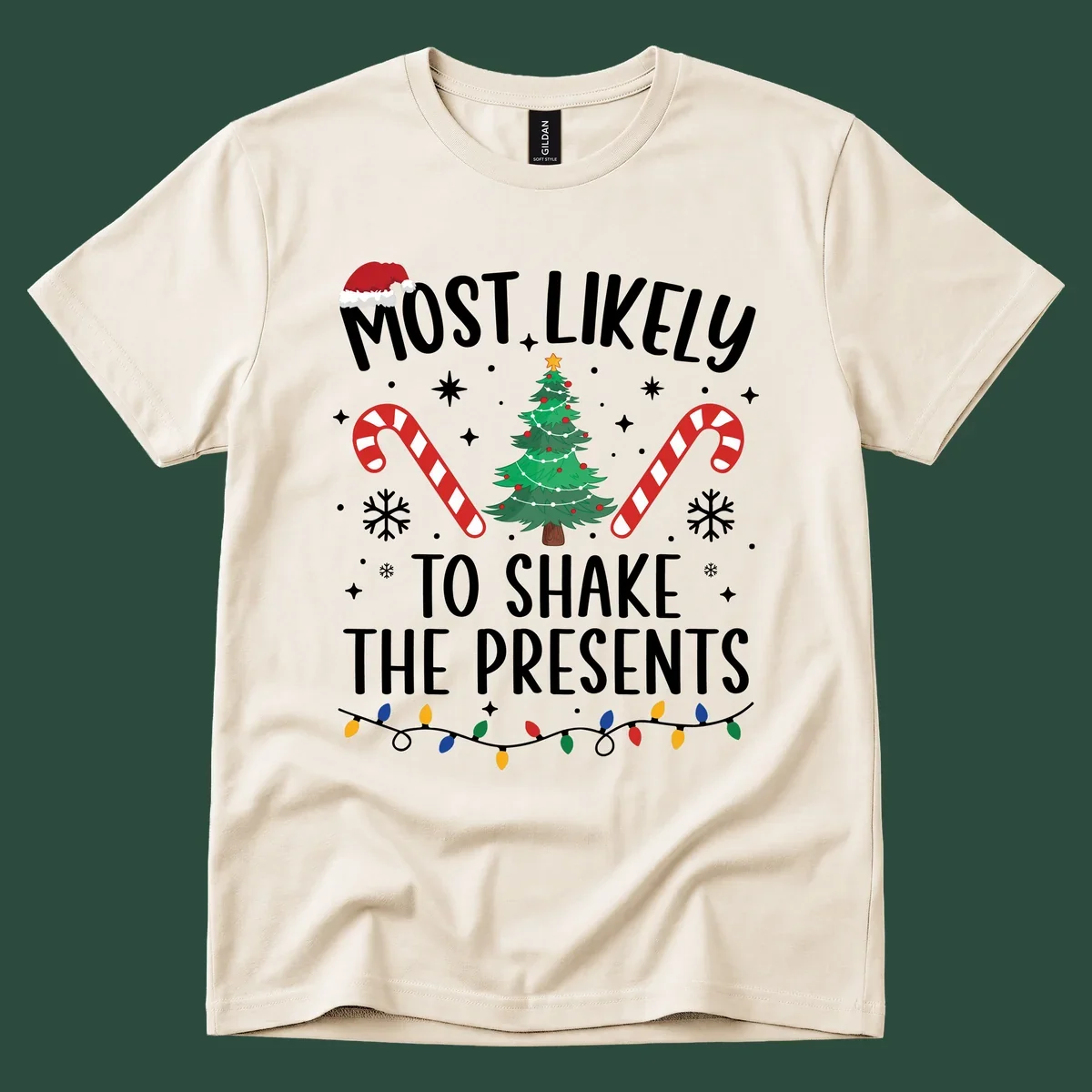Christmas design with text "Most Likely To Shake The Presents", Santa hat, candy canes, tree, snowflakes, and lights.