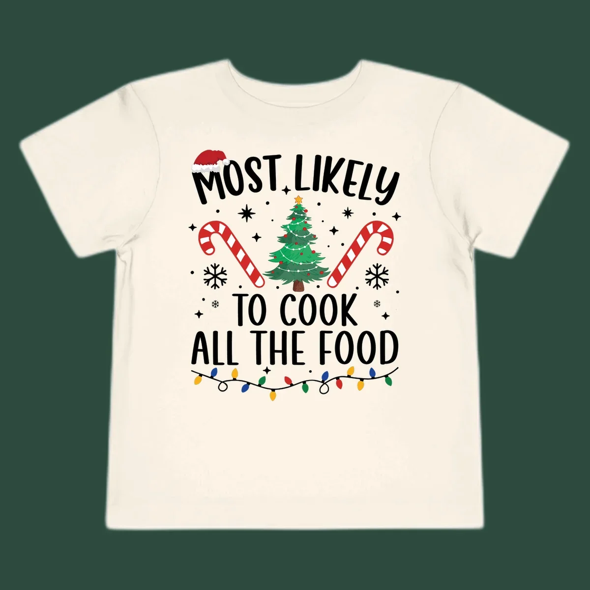 Most Likely To Cook All The Food Christmas design with Santa hat, tree, candy canes, and lights.