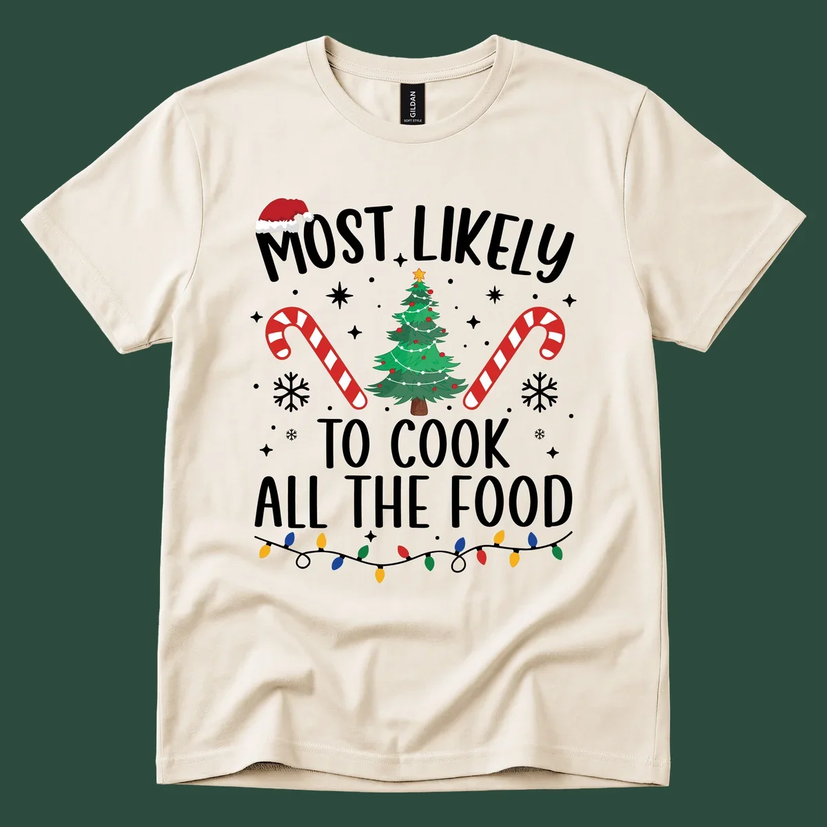 Most Likely To Cook All The Food Christmas design with Santa hat, tree, candy canes, and lights.