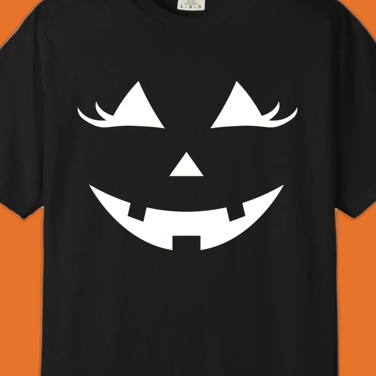 Spooky grinning jack-o-lantern face with triangle eyes and jagged smile, graphic for halloween.