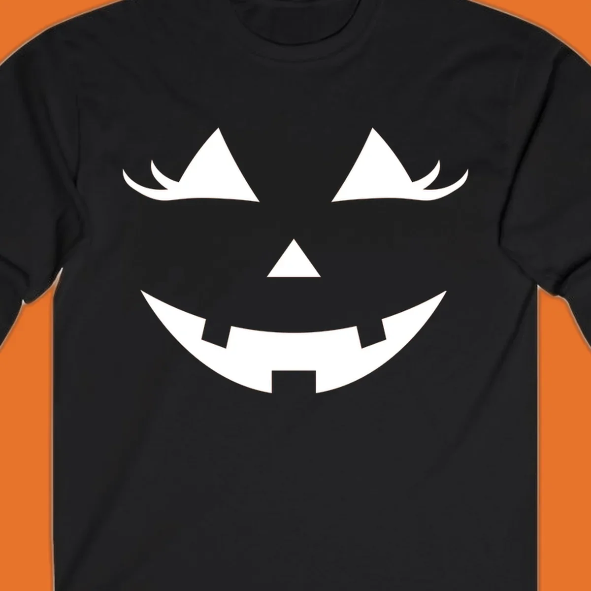 Spooky grinning jack-o-lantern face with triangle eyes and jagged smile, graphic for halloween.