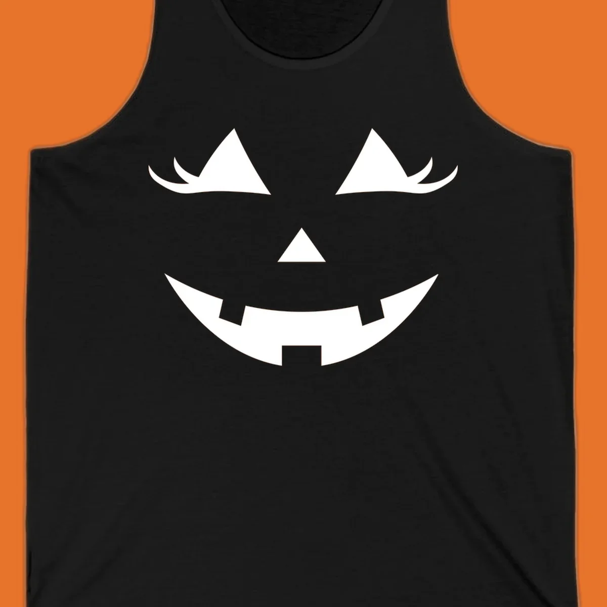 Spooky grinning jack-o-lantern face with triangle eyes and jagged smile, graphic for halloween.