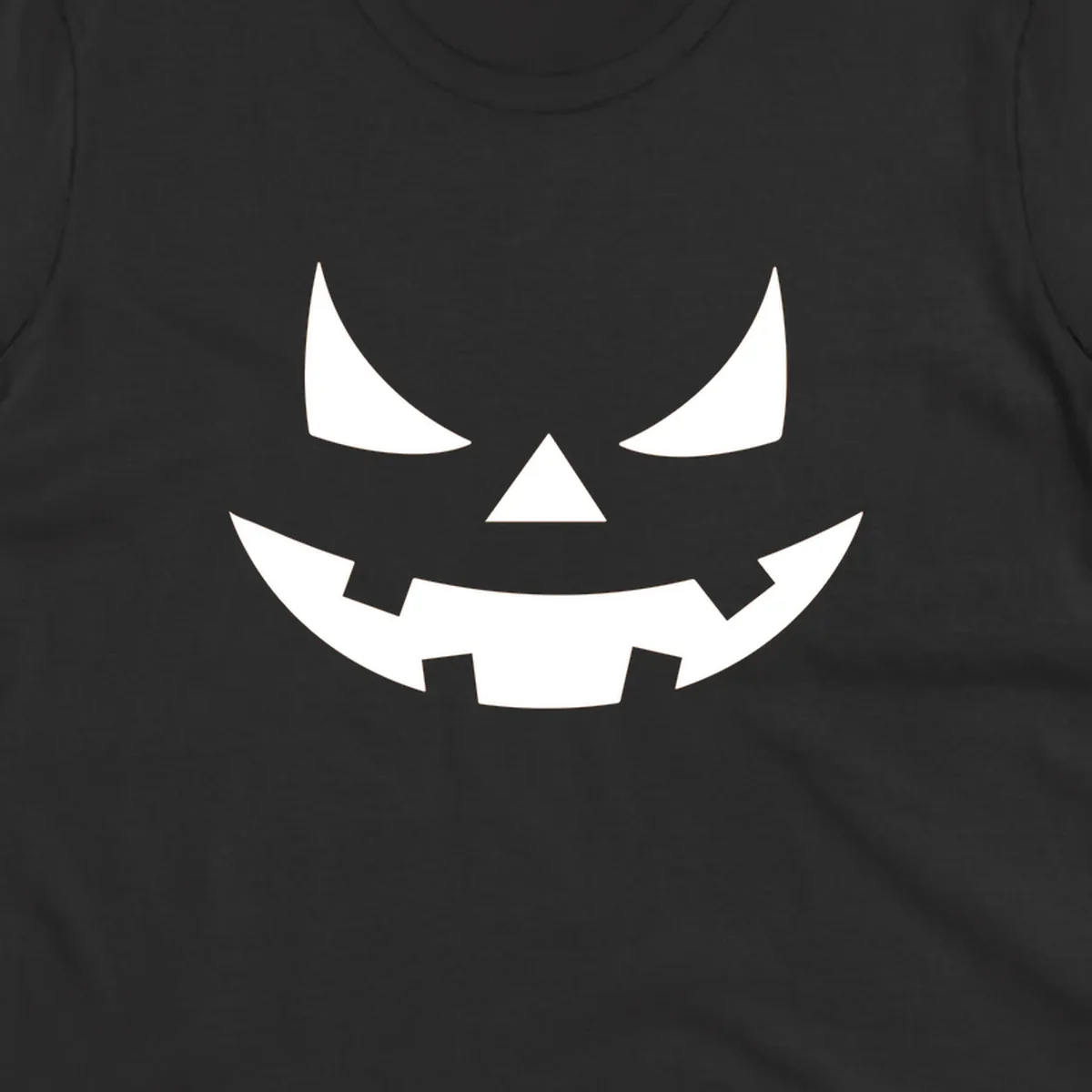 Spooky jack-o-lantern face illustration with angled eyes and jagged smile, for Halloween.