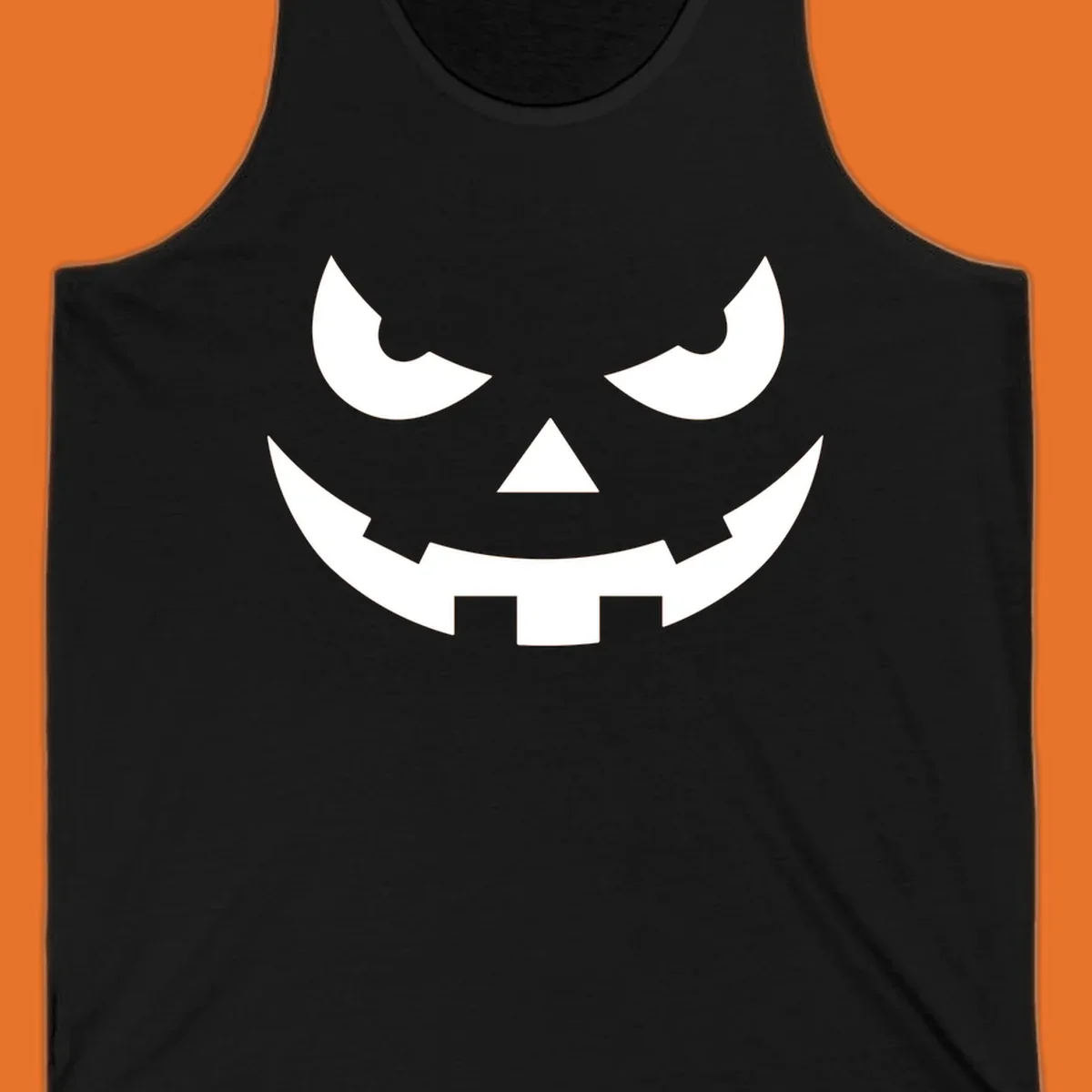Spooky pumpkin face graphic with sharp eyes and a jagged grin.