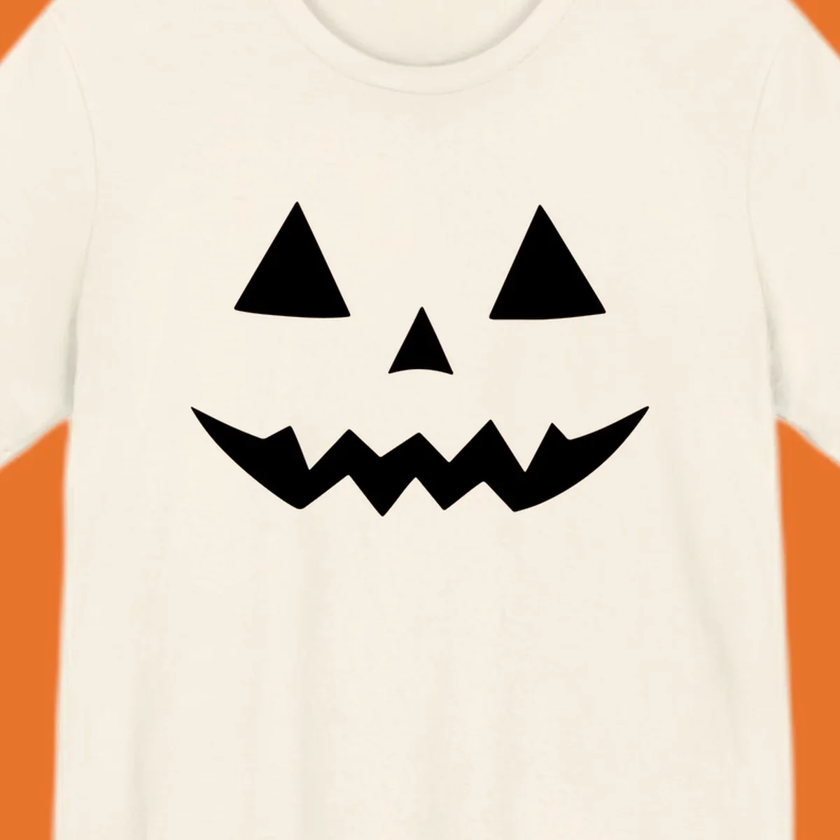Classic jack-o-lantern face with triangle eyes and jagged mouth graphic.