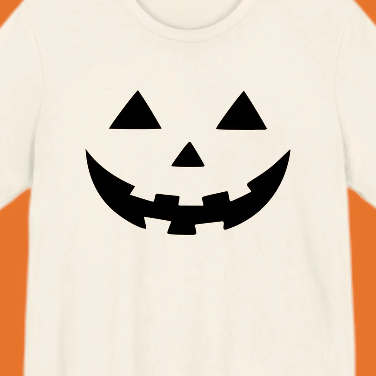 Classic jack o lantern face graphic with triangle eyes and jagged smile.
